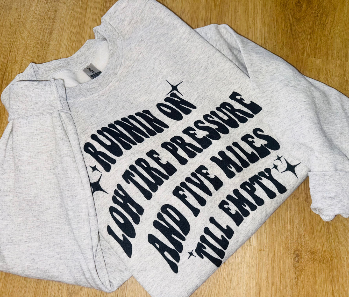 Running on low tire pressure Crewneck TAT 3 WEEKS